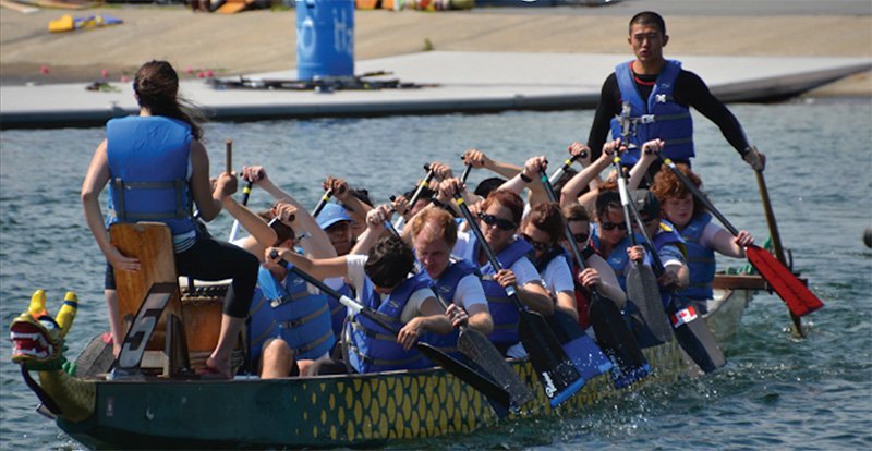 Another picture of a para dragon boat team on the water.