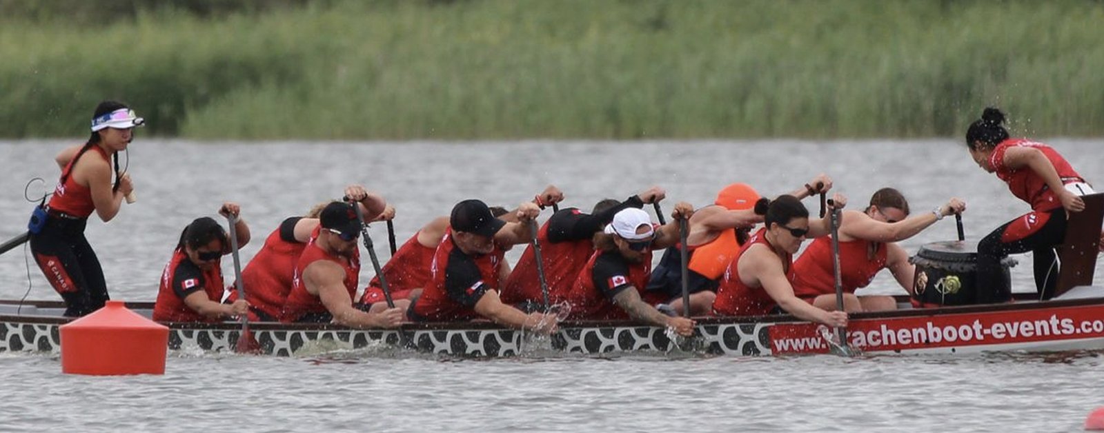 Another picture of a para dragon boat team on the water.